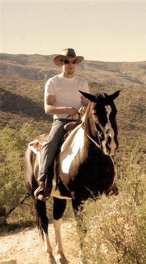 Jimmy Messer Riding a horse in Tucson Arizona